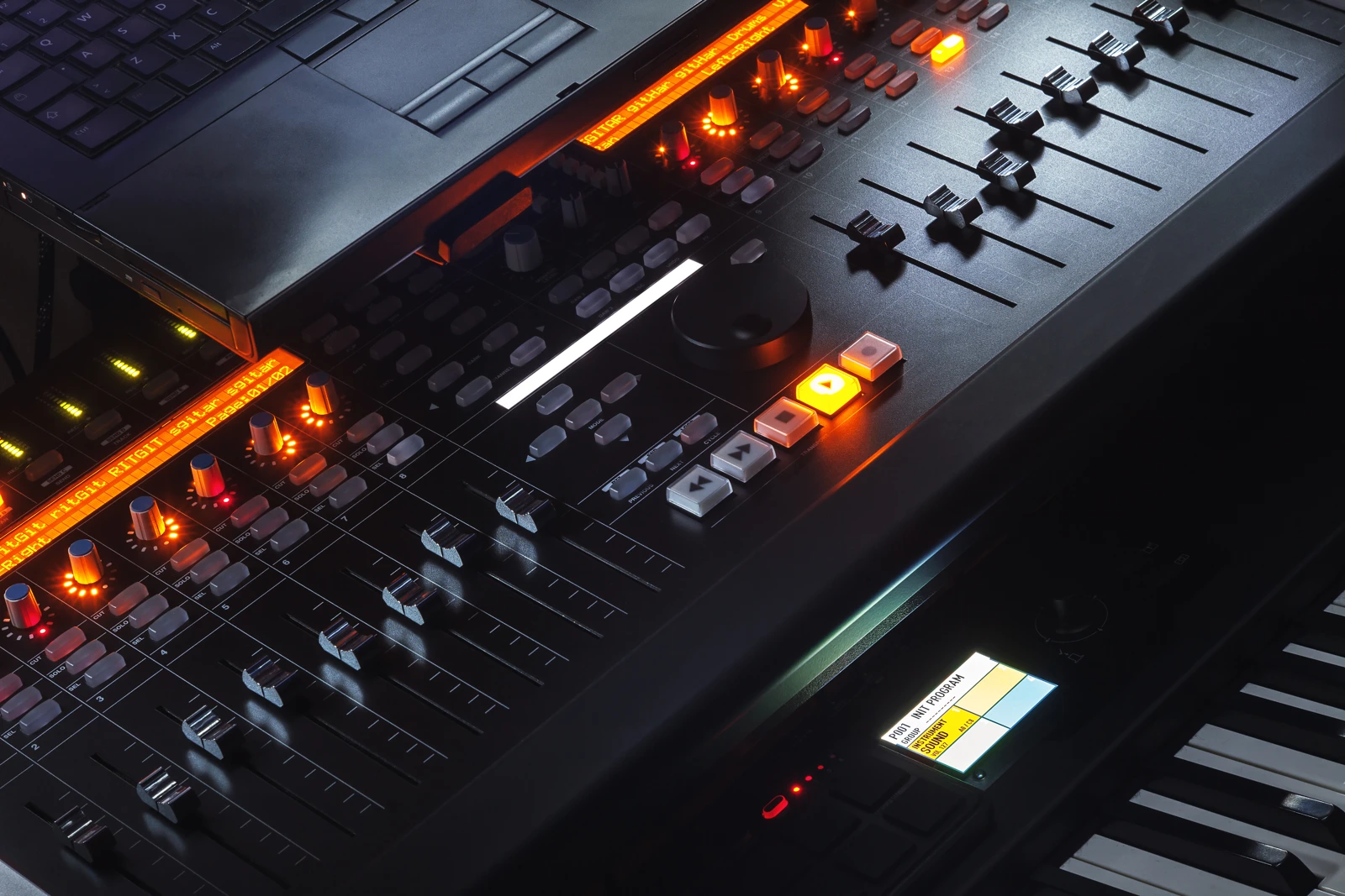 Faders and controls on audio mixing equipment