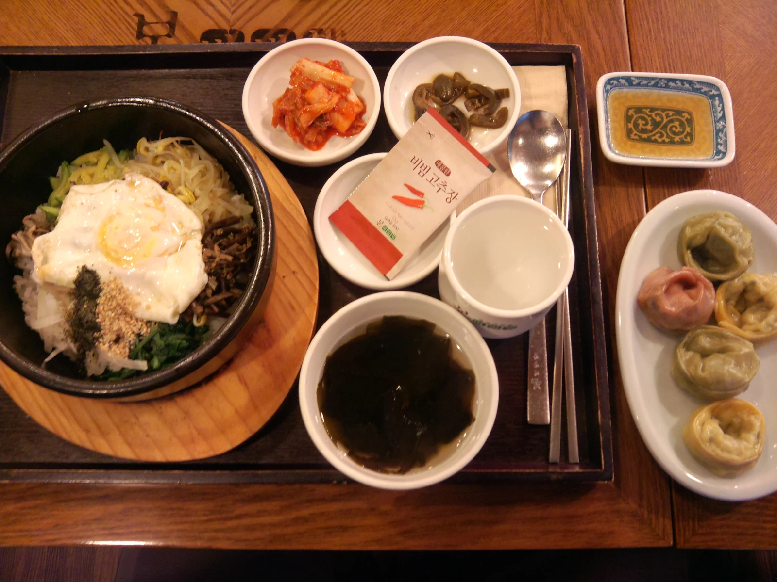 Bibimbap with seaweed soup and dumplings