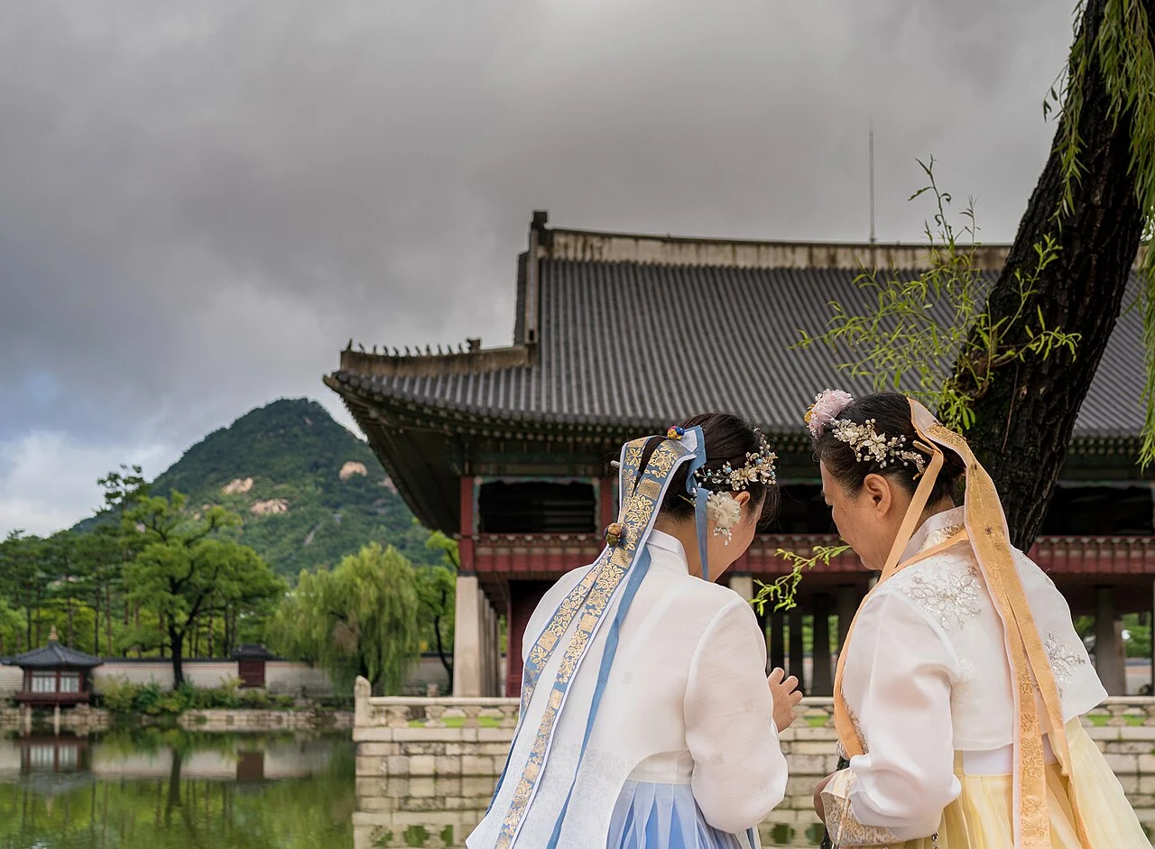 Two visitors wearing hanbok at Gyeongbokgung. Photographed 20 September 2025.
